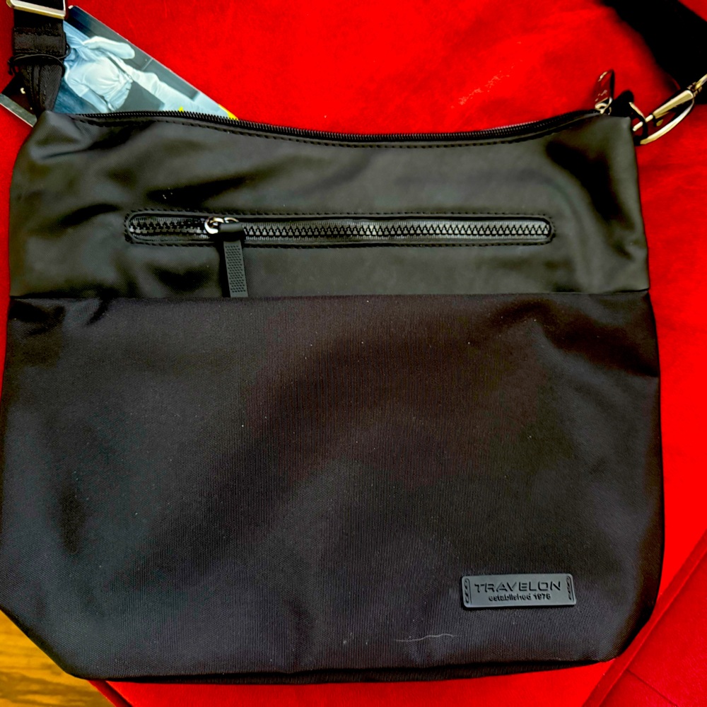 Brand new Travelon anti-theft crossbody bag